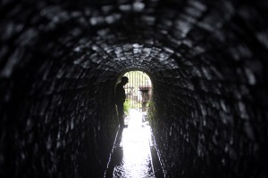 Boy in mine tunnel