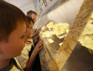 Children looking at the mining minerals in a museum display